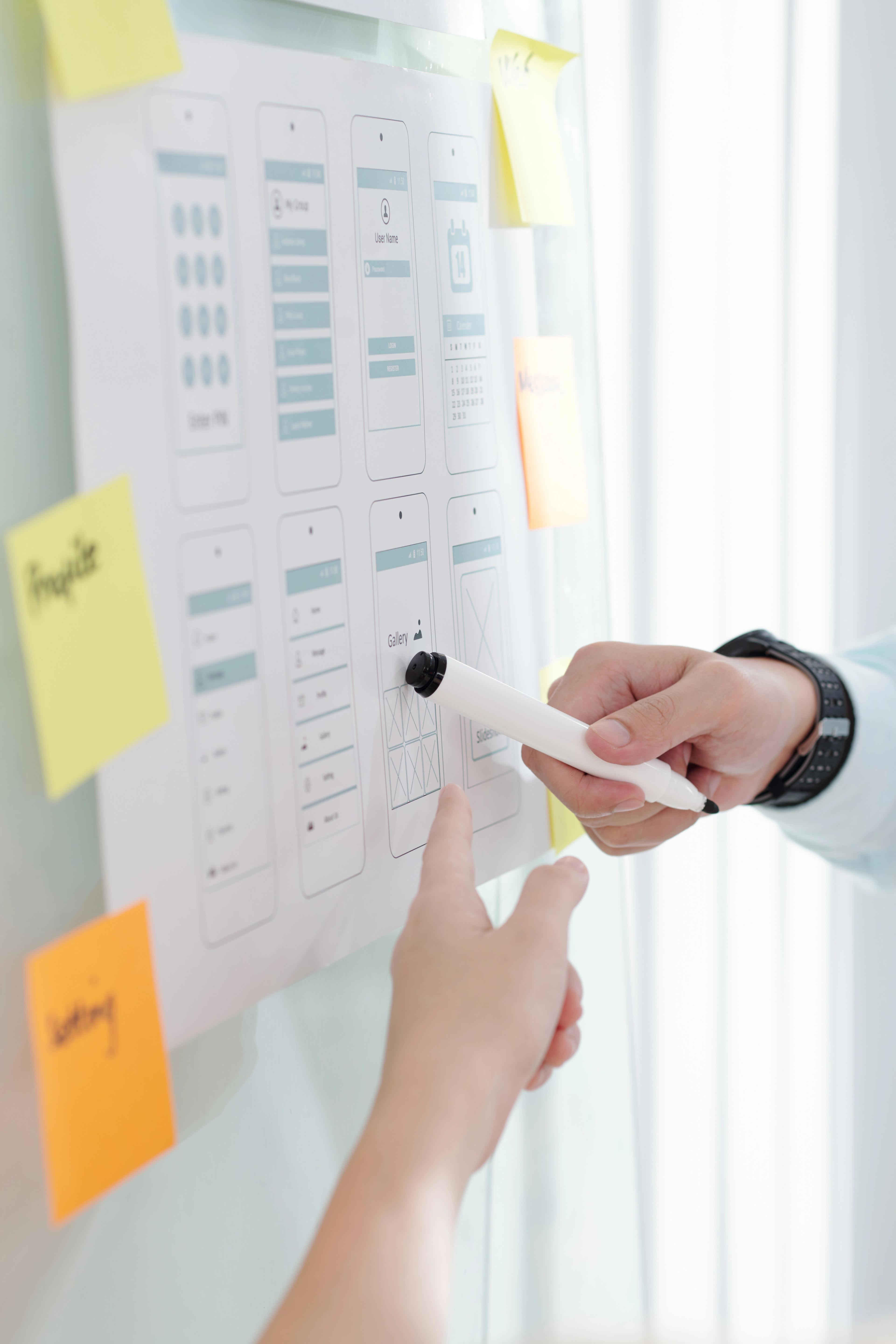 colleagues-discussing-interface-details-2025-01-29-08-21-53-utc-_1_